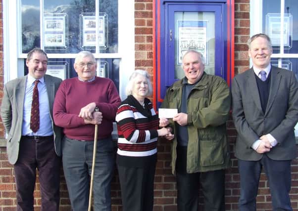 Horncastle Fatstock chairman Andy Smith presented the cheque to Headway representatives Mr and Mrs Dick Read; also pictured on behalf of the Charity. Also attending were Fatstock Show secretary Richard Evison and treasurer Robert Bell. EMN-160103-165650001