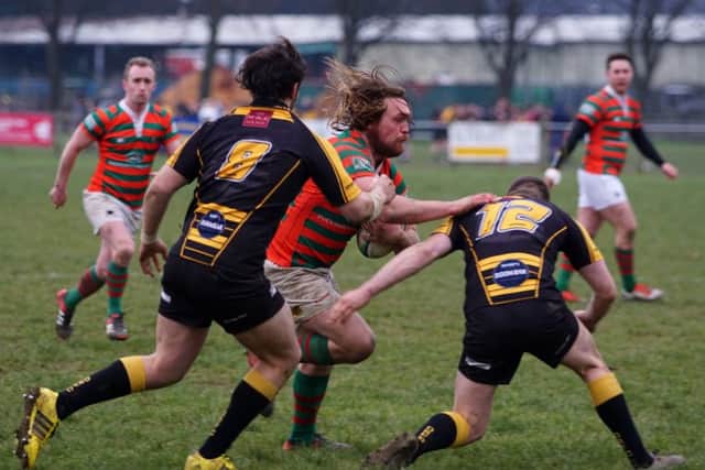 Jake Pryer charges forward.