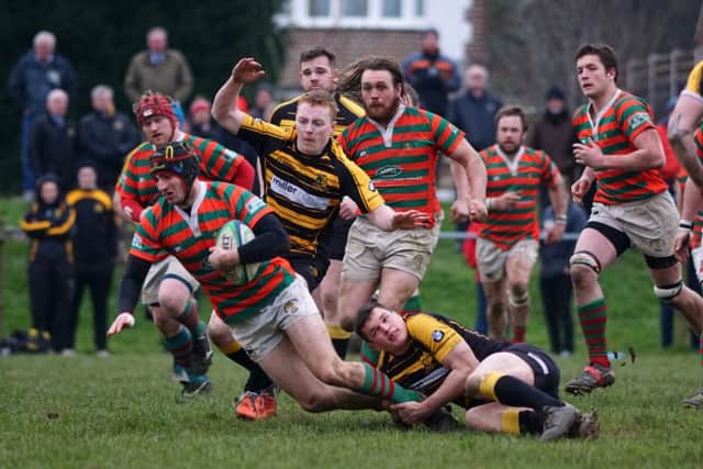 Rob Batterbury looks to gain ground.