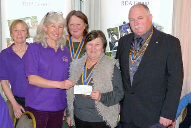Caroline Sanderson and Janet Jones from Lincolnshire RDA receiving the cheque from the Presidents of the three Rotary Clubs - Dianna Broadmeadow (Louth), Gill Marsh (Alford and Mablethorpe) and Nigel Blanchard (Spilsby).