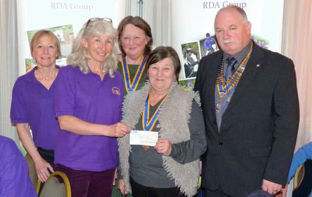 Caroline Sanderson and Janet Jones from Lincolnshire RDA receiving the cheque from the Presidents of the three Rotary Clubs - Dianna Broadmeadow (Louth), Gill Marsh (Alford and Mablethorpe) and Nigel Blanchard (Spilsby).