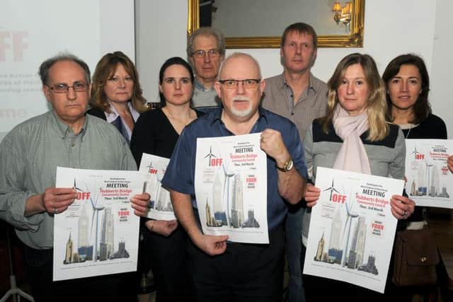 'Heck Off' Heckington Fen wind turbine action group at Hume Arms, South Kyme. Committee members and guests L-R Melvin Grosvenor, Cllr Julia Harrison, Charlotte Turner - guest speaker, Mervyn Head, Chris Pavely, David Casswell, Dagmar Burnett, Clare Stephenson. EMN-160203-104359001