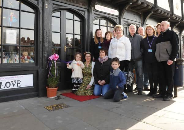 New Loveshack Hobby Shop on South Street, Boston. Officially opened by disabled girl Jeanie Walsh-Dodd, five. Pictured with founder of the charity Karen Ward, volunteers and committee members.