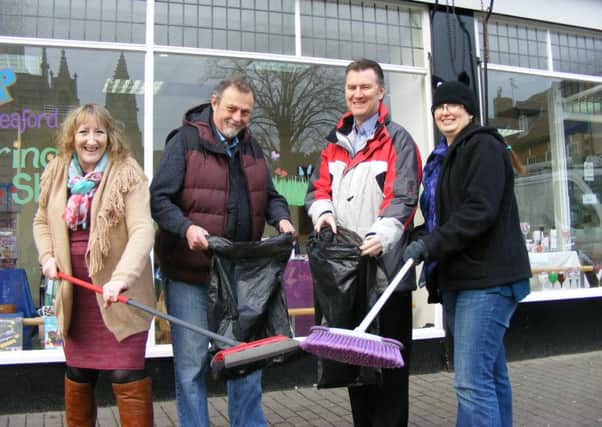 Get ready to Clean for the Queen. Sleaford Town Team members, from left - Bev and Eddie Jenkins, Andrew Rayner and Ruth Philp. EMN-160203-173157001