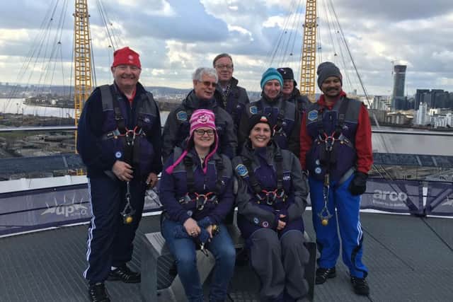 Lucy Hawleys on top of the world after her charity O2 climb. ANL-160403-120319001