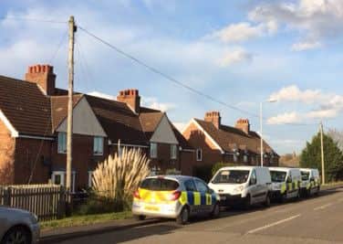 Police at the scene of a murder investigation in Croft Bank. ANL-160403-164542001