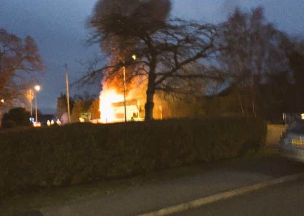 The scene on the A46 last night when a double-decker bus was on fire at Middle Rasen. Photo: Paul Dutchburn ANL-160503-101050001
