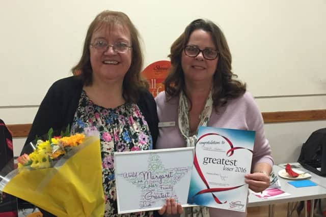 Super slimmer Margaret Slawson (left) with group leader Shona Drew EMN-161203-122743001