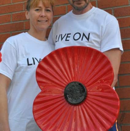 David Moulds and his wife Michaela EMN-160803-115203001
