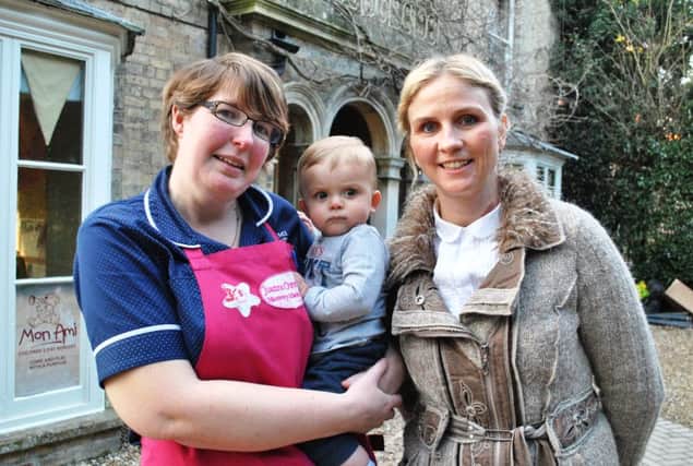Jo Overton (left), Manager of Mon Ami in Alford, with owner Samantha Britton and Bobby Stead, one of the children at the nursery.