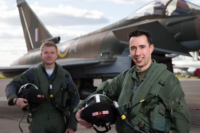 2015 Typhoon Display Pilot Flight Lieutenant Johnny Dowen hands over the 2016 Typhoon Display Pilot role to Flight Lieutenant Mark Long. Photo By:- SAC Jack Welson(RAF) CON-OFFICIAL-