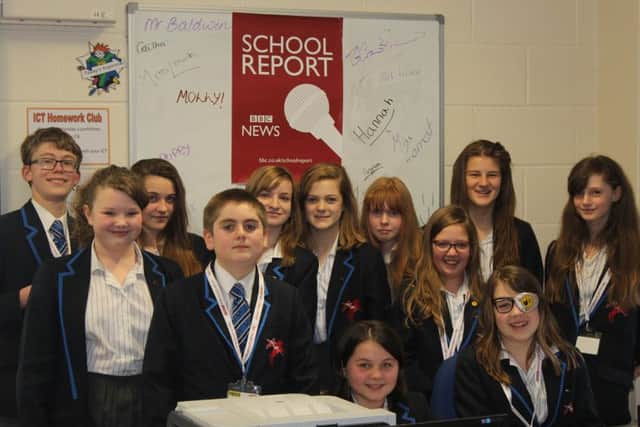 The news team at St George's Academy on BBC News School Report Day. EMN-161003-172601001
