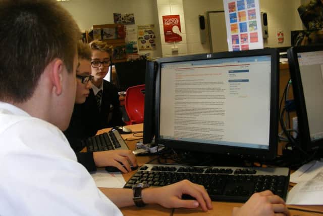 Tadhg Camm, 14, of Carre's Grammar School research his story on happiness for BBC News School Report Day. EMN-161003-174130001
