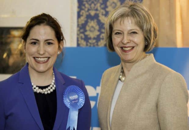 Victoria Atkins MP with Home Secretary Theresa May.