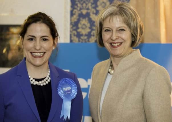 Victoria Atkins MP with Home Secretary Theresa May.