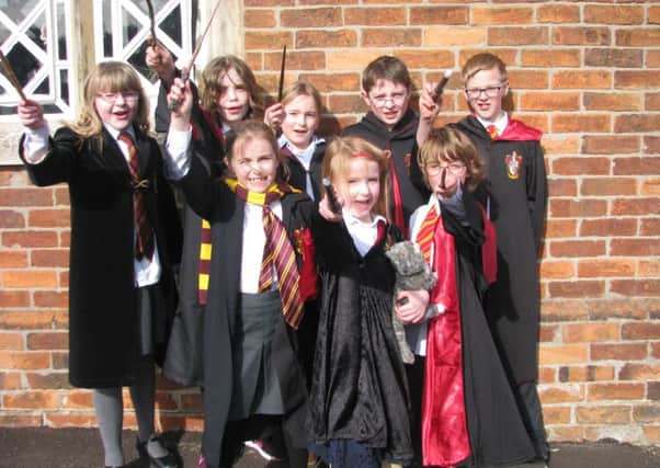 Harrys and Hermiones dressed up for World Book Day at St Gilbert of Sempringham Primary School at Pointon. EMN-161103-172754001