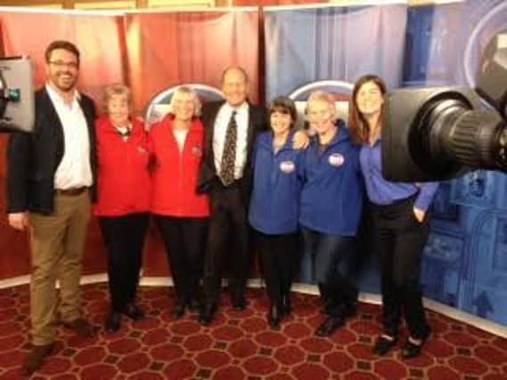 Elizabeth Sargent on Bargain Hunt with the teams and presenters. ANL-160317-140826001