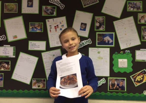 Ellie Reeve Groom of St Peter & St Paul CE Primary School, Burgh-le-Marsh, with her Pea Sausage Rolls recipe. ANL-160318-184752001