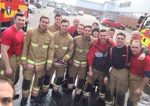 Boston crew and cadets' car wash 'selfie' EMN-160313-094033001