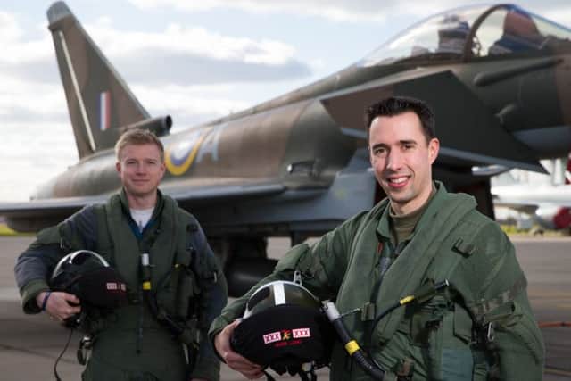 2015 Typhoon Display Pilot Flight Lieutenant Johnny Dowen hands over the 2016 Typhoon Display Pilot role to Flight Lieutenant Mark Long.Photo By:- SAC Jack Welson(RAF EMN-160313-190807001