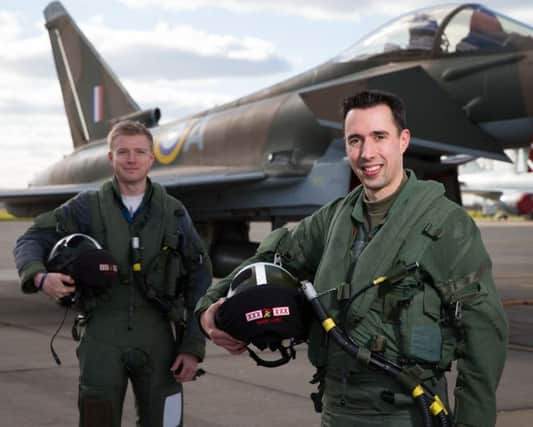 2015 Typhoon Display Pilot Flight Lieutenant Johnny Dowen hands over the 2016 Typhoon Display Pilot role to Flight Lieutenant Mark Long.

Photo By:- SAC Jack Welson(RAF EMN-160313-190807001