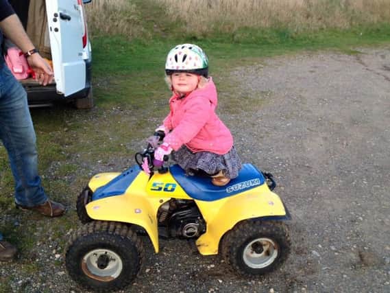 Four-year-old Sienna enjoys a ride on her beloved quad bike, which was stolen by heartless thieves last week. YGMcwQcT9c1h2oMw0PiR