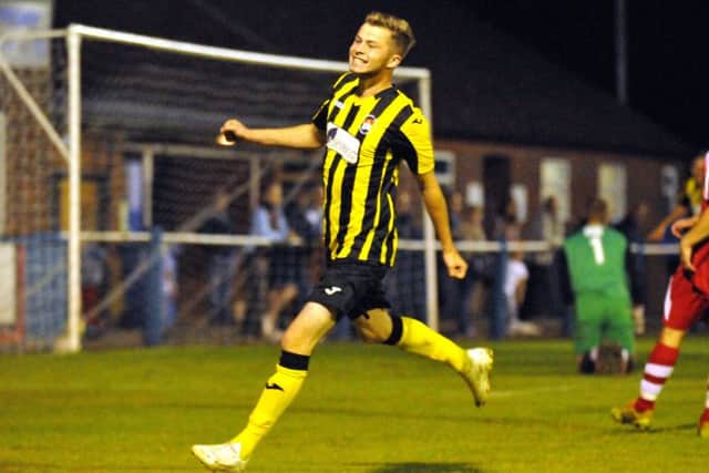 Chris Ward celebrates his winner for Holbeach in the league game at Boston