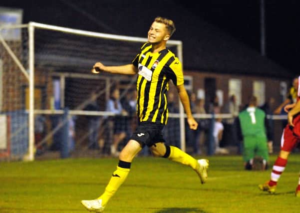 Chris Ward celebrates his winner for Holbeach in the league game at Boston