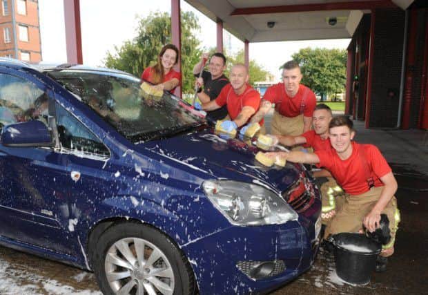 Skegness firefighters are ready to clean your car on Saturday. ANL-160318-104618001