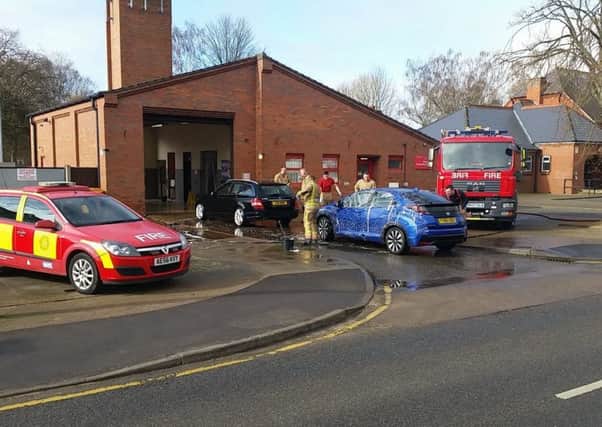 Firefighters at Kirton raised over Â£400 yesterday (Saturday) doing car washes for charity. EMN-160320-093109001