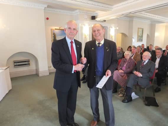 Jim Sawyer receives his certificat from Air Marshall Sir Dusty Miller EMN-160323-153640001