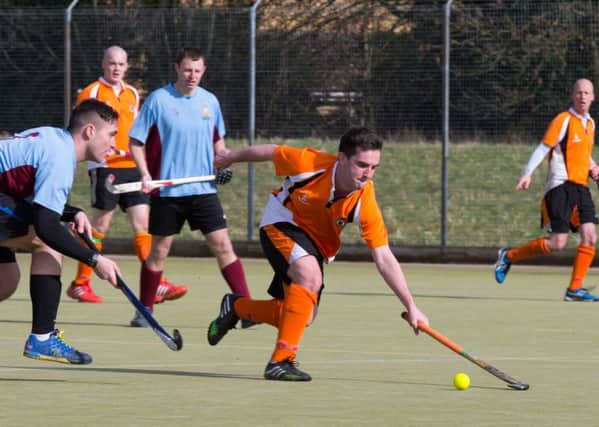 RAF Coningsby hockey club in action. Photo: SAC Chris Ellis CON-OFFICIAL-20160303-312