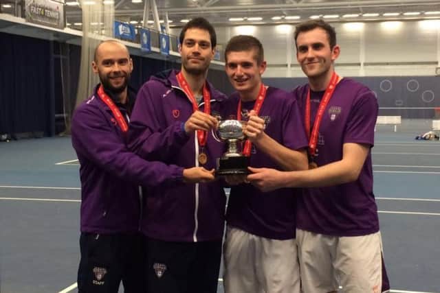 Dom Beesley (second right) celebrates the national title.