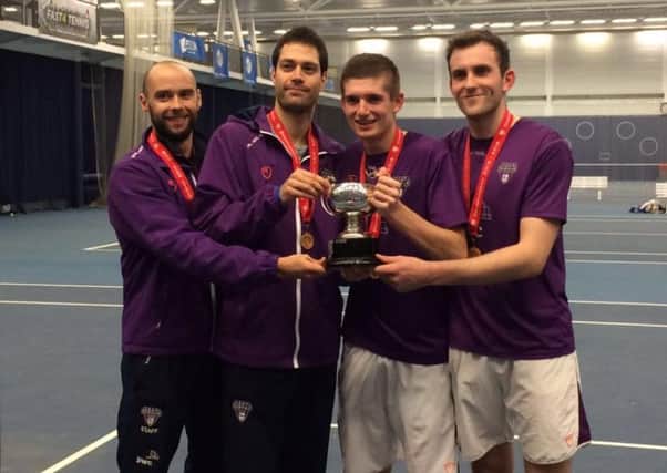Dom Beesley (second right) celebrates the national title.