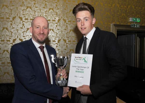 Billy Spooner, the Junior Sportsman of the Year, collected his trophy from Boston Standard sports editor Duncan Browne, on behalf of sponsors Dewhurst Trophies.