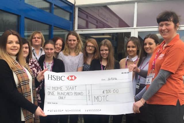 The cheque presentation at Monks' Dyke Tennyson College.