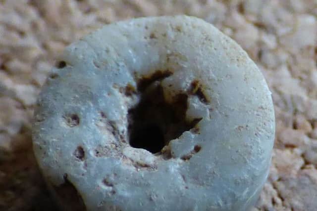 The small bead was found on the Julian Bower site, and has been confirmed by an expert to be of Anglo-Saxon origin.