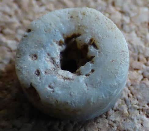 The small bead was found on the Julian Bower site, and has been confirmed by an expert to be of Anglo-Saxon origin.