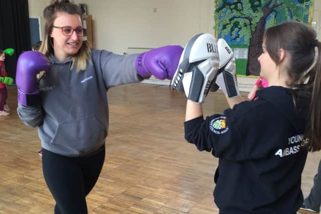 Sophie Allen, limbering up for her boxercise session. EMN-160331-144622001
