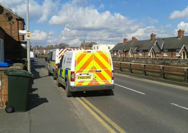 Police at the scene of the man's death in Horncastle Road, Boston
