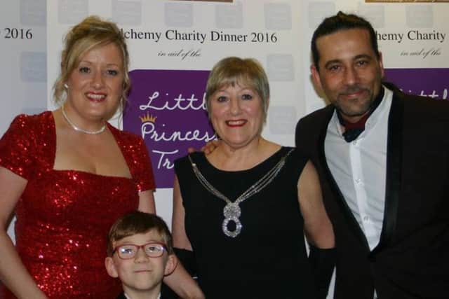 Staff and family from Salon Alchemy including Kelly Varley (left) and Rocco Tizzano (right). 9mOd2TI9nOlQCN9rLl9t