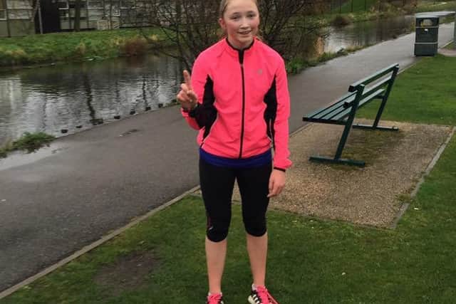 One down - Charlotte Bailey after her first 10k last week. EMN-160404-161627001