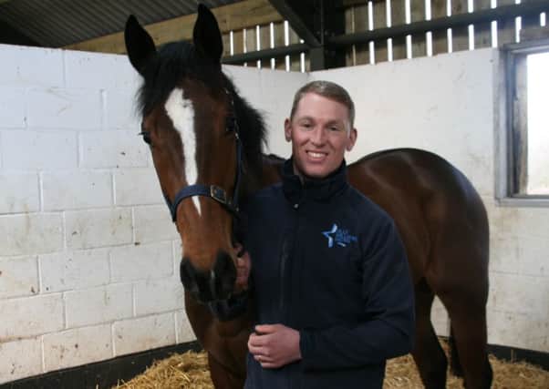 Trainer Olly Williams with Tricky Dicky at Stone Stables EMN-160404-172730002