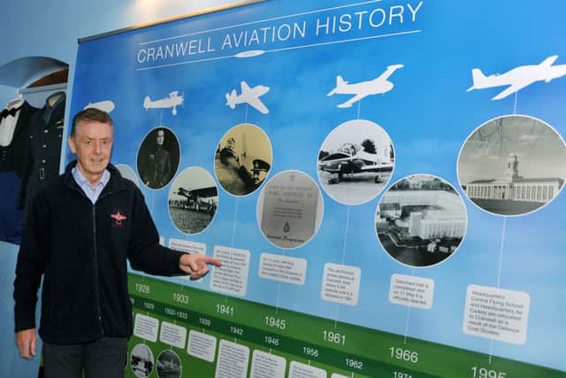 Cranwel Aviation Heritage Centre volunteer, Arthur Moore shows off the new history board. EMN-160404-174435001
