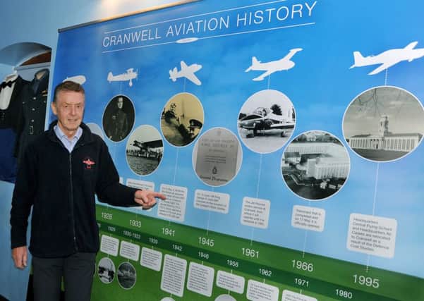 Cranwel Aviation Heritage Centre volunteer,  Arthur Moore shows off the new history board. EMN-160404-174435001