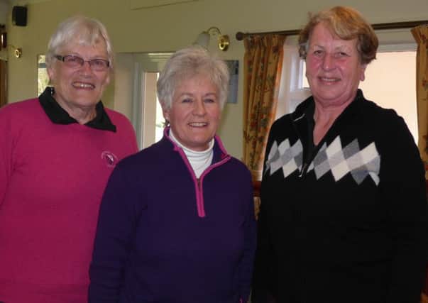 Spoons winners Ronnie Sulivan (left) and Margaret Dixon (right) with club lady captain Helen Grinham EMN-160704-095123002