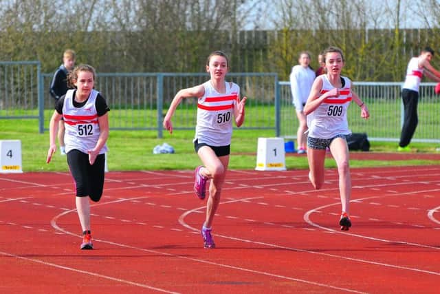 Beatrice Spendlove, Evie Odlin and Ellie Odlin in the under 15 girls' 100m. Photo: Graham Stephenson. EMN-161104-164054002