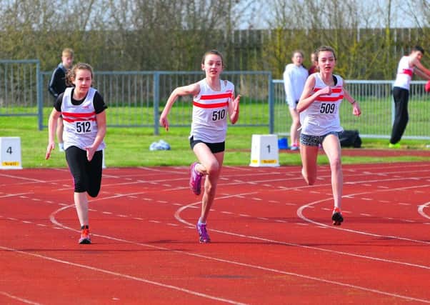 Beatrice Spendlove, Evie Odlin and Ellie Odlin in the under 15 girls' 100m. Photo: Graham Stephenson. EMN-161104-164054002