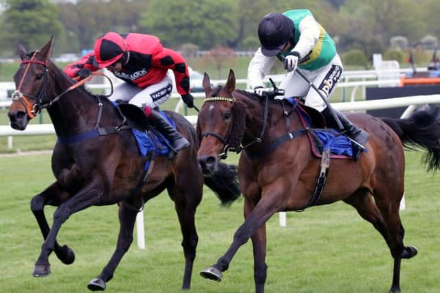 Market Rasen Racecourse Ambassador Sean Bowen (right-green silks) shows winning style last May EMN-160704-121401002