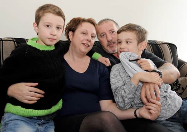 The Pettitt family of Spilsby are holding a Vigil to the Death of Care. Pictured are (from left) Leon, 9, mum Dominique, dad Steve and  Sebastien, 7. ANL-160419-092920001